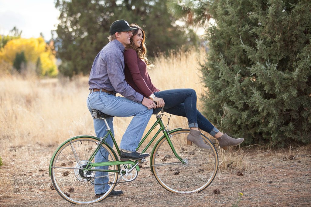 cute couple on bicycle