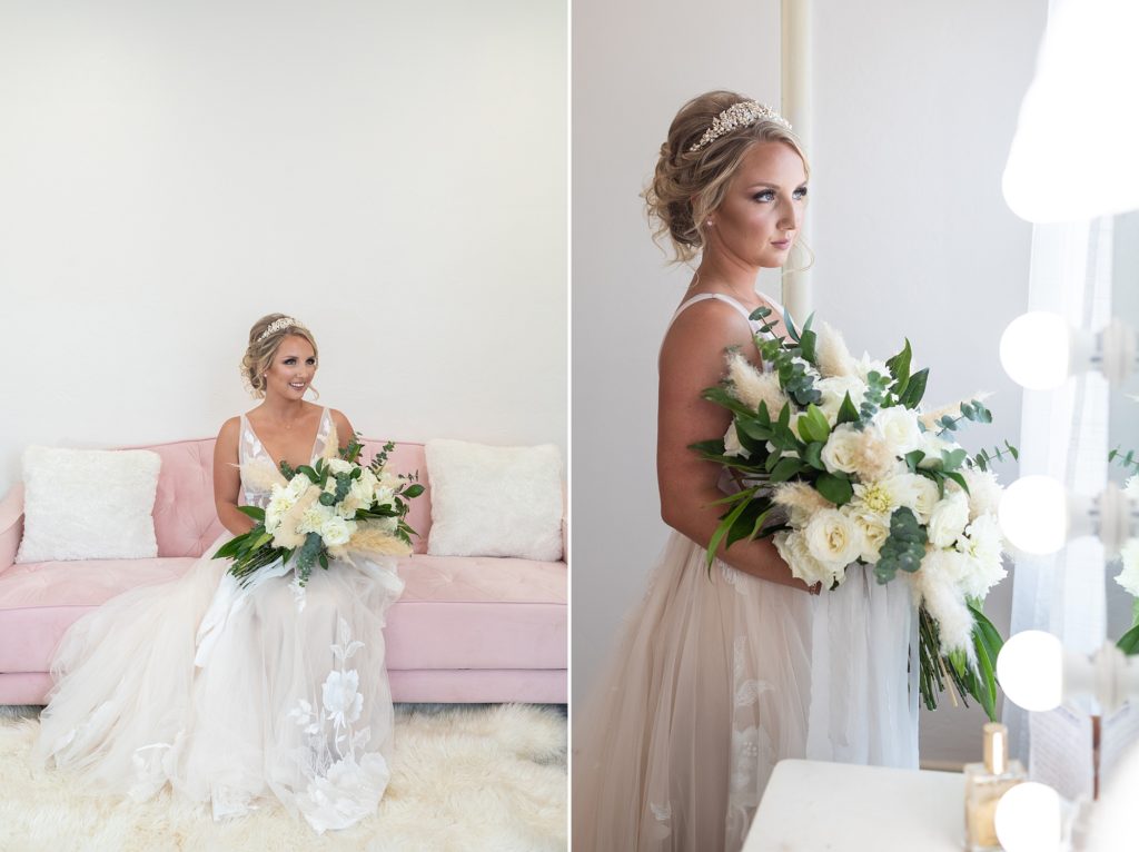 bride on pink couch with bouquet